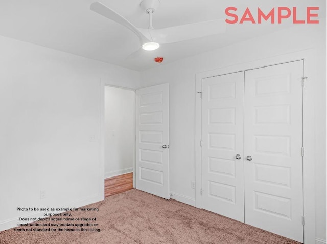 unfurnished bedroom with light carpet, a closet, and ceiling fan