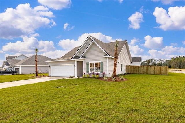 view of front of house featuring a front yard and a garage