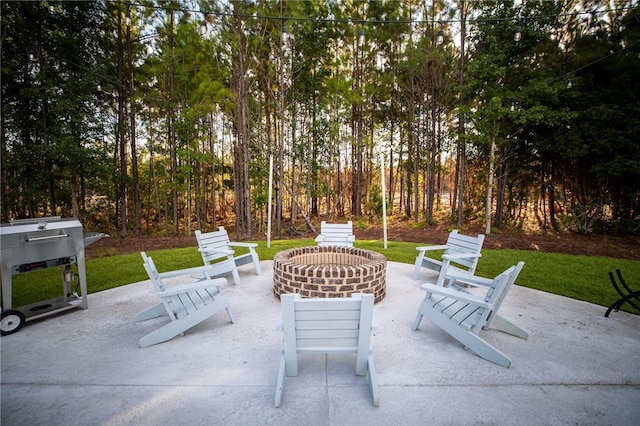 view of patio / terrace featuring a fire pit