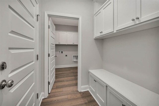 mudroom with dark hardwood / wood-style floors