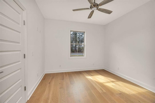 spare room with ceiling fan and light hardwood / wood-style floors