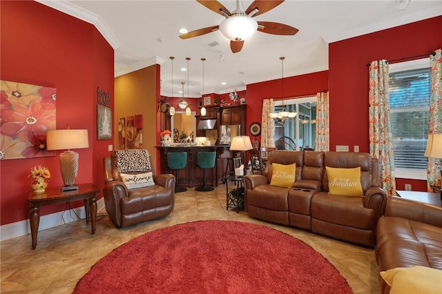 living area featuring visible vents, ornamental molding, ceiling fan with notable chandelier, recessed lighting, and baseboards