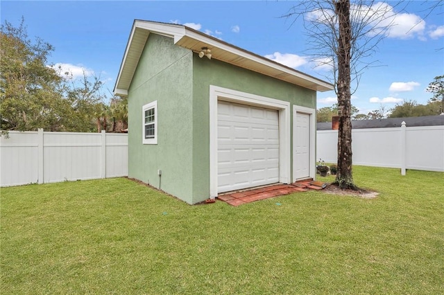 garage with fence