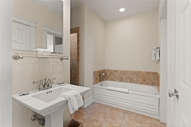 bathroom with tile patterned flooring and plus walk in shower