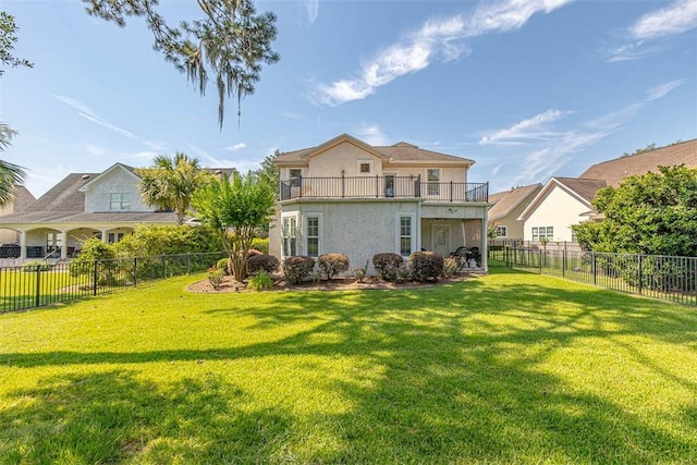 122 Country Club Dr, Saint Simons Island, GA 31522 - back of house featuring a lawn and a balcony