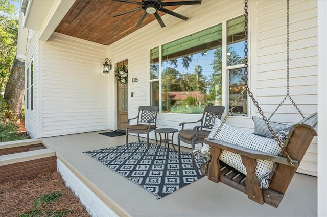 view of patio featuring covered porch and ceiling fan