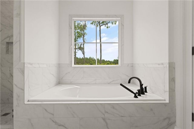 bathroom featuring a bath