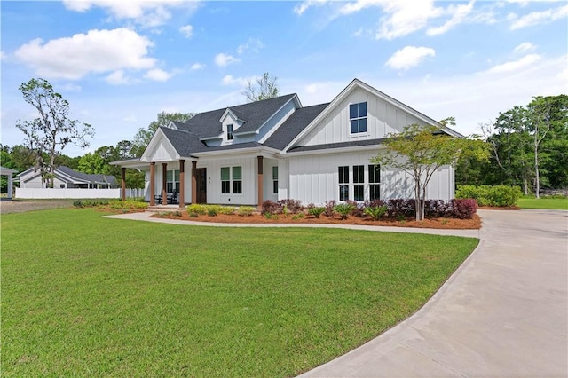 modern inspired farmhouse featuring board and batten siding