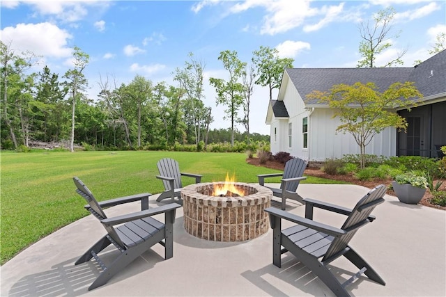 view of patio / terrace with an outdoor fire pit