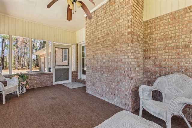 view of patio with ceiling fan