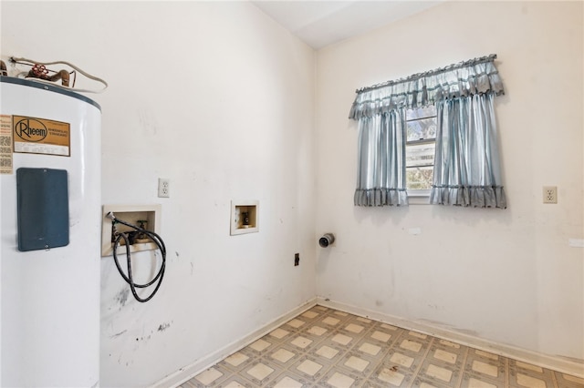 washroom featuring washer hookup, laundry area, baseboards, and light floors