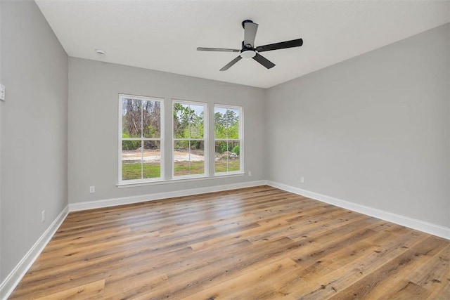 225 Water Crest Dr, Brunswick, GA 31523 - spare room featuring baseboards, ceiling fan, and wood finished floors