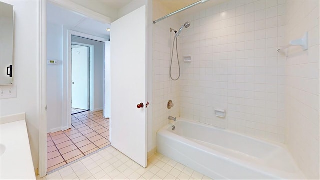 full bath featuring tub / shower combination, vanity, and tile patterned floors