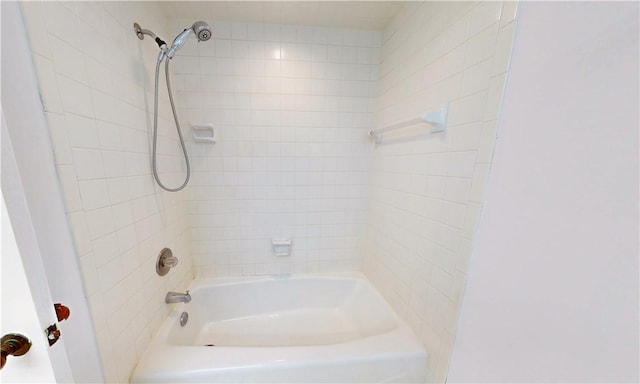 bathroom featuring washtub / shower combination