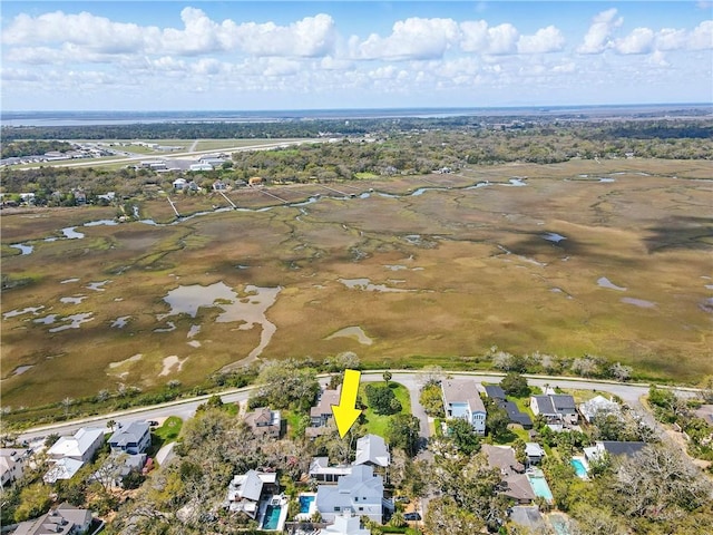 birds eye view of property with a residential view