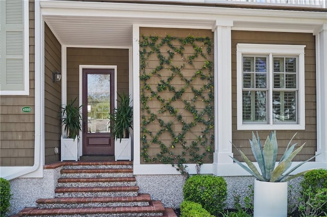 entrance to property with a porch