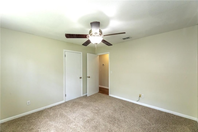 907 Euclid Ave, Waycross, GA 31501 - unfurnished bedroom featuring carpet flooring and ceiling fan