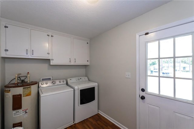 907 Euclid Ave, Waycross, GA 31501 - washroom with electric water heater, cabinet space, washer and dryer, dark wood finished floors, and a textured ceiling