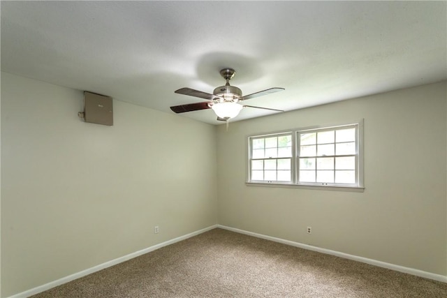 907 Euclid Ave, Waycross, GA 31501 - carpeted empty room with a ceiling fan and baseboards