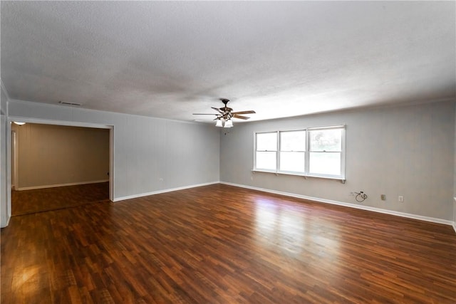 907 Euclid Ave, Waycross, GA 31501 - spare room with wood finished floors, ceiling fan, and a textured ceiling