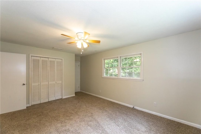 907 Euclid Ave, Waycross, GA 31501 - unfurnished bedroom with carpet flooring, a closet, and ceiling fan