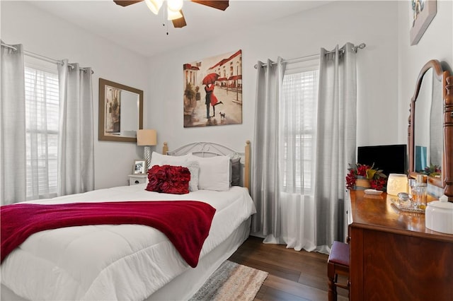 bedroom featuring wood finished floors and ceiling fan
