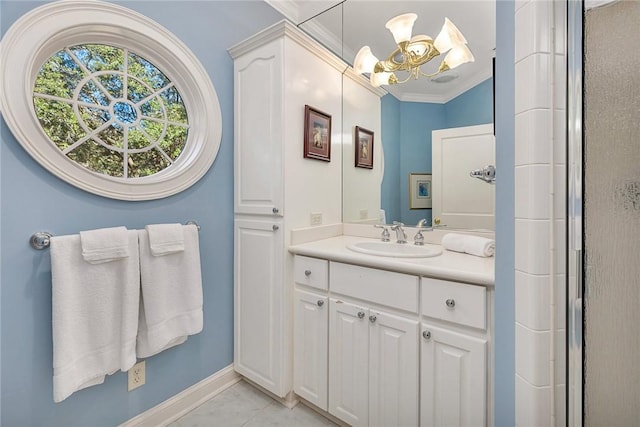 bathroom with a notable chandelier, tile patterned floors, crown molding, vanity, and a shower with shower door