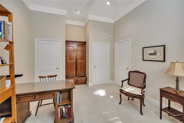 carpeted home office featuring crown molding