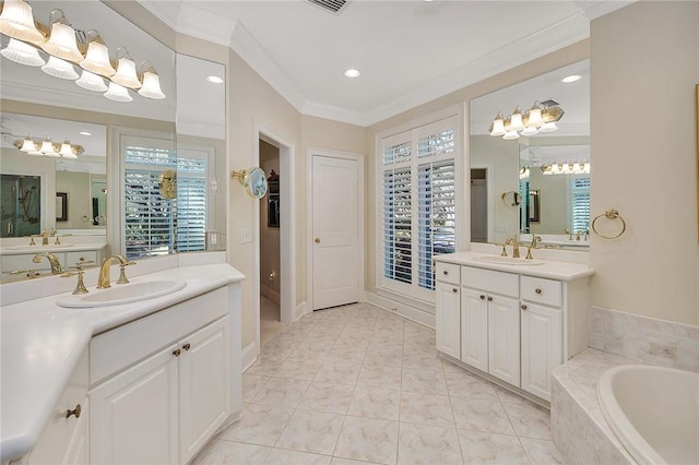 bathroom featuring tile patterned floors, vanity, ornamental molding, and tiled tub