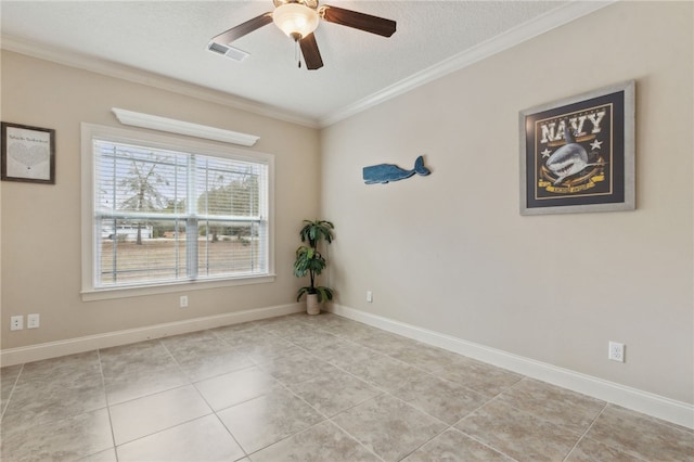 unfurnished room featuring ceiling fan, ornamental molding, a textured ceiling, and light tile patterned flooring