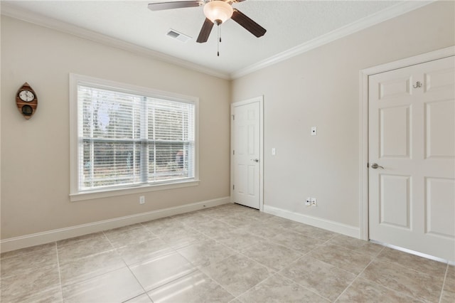 unfurnished room with light tile patterned floors, ornamental molding, and ceiling fan