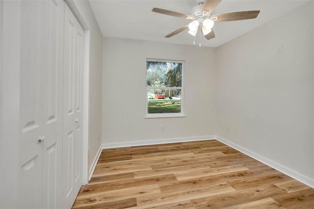 515 Nottingham Dr, Brunswick, GA 31525 - unfurnished bedroom featuring a closet, light wood-type flooring, and a ceiling fan