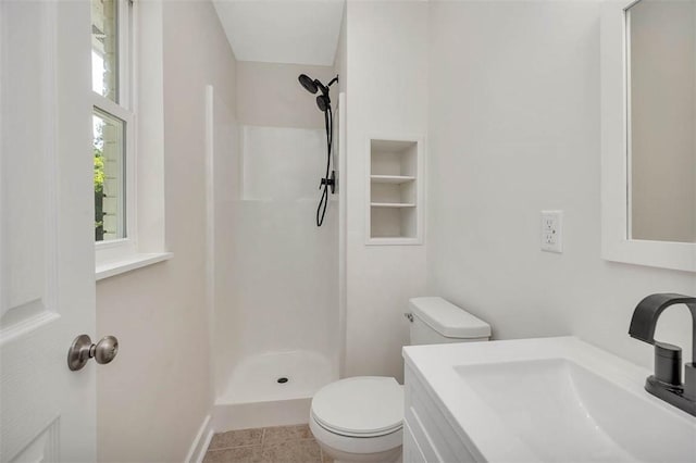 515 Nottingham Dr, Brunswick, GA 31525 - bathroom with a walk in shower, vanity, and tile patterned floors