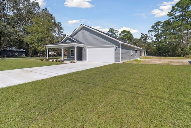 view of front of house with a garage and a front lawn