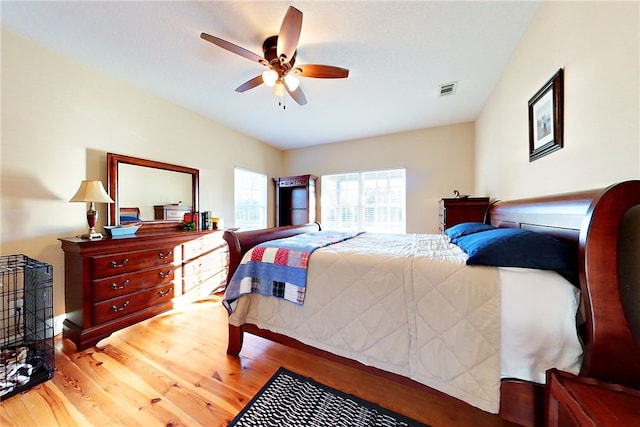 bedroom featuring hardwood / wood-style flooring and ceiling fan
