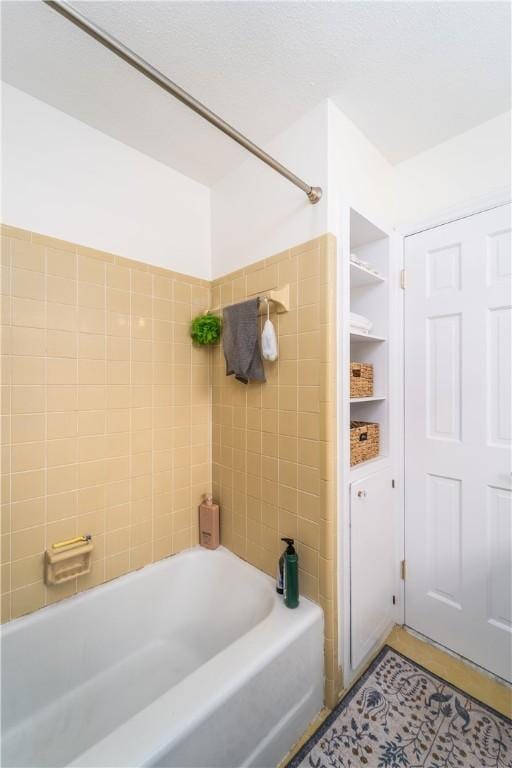 bathroom featuring tub / shower combination