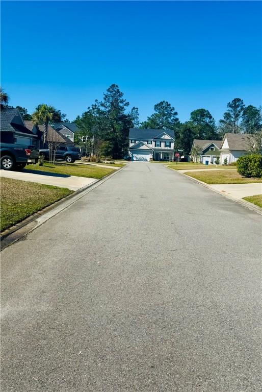 view of road with curbs