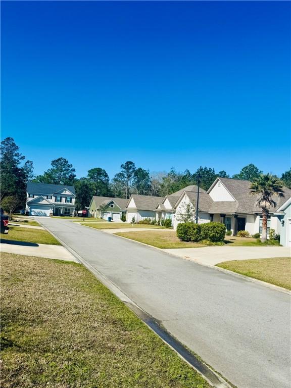 view of street featuring a residential view