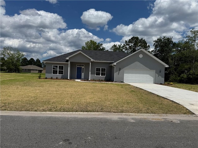 100 Haven Ct, Brunswick, GA 31523 - ranch-style home featuring a front lawn, a garage, driveway, and stucco siding