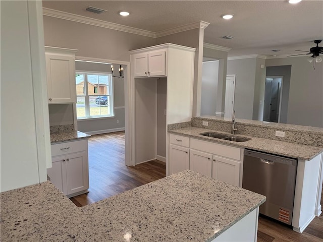 100 Haven Ct, Brunswick, GA 31523 - kitchen featuring stainless steel dishwasher, a sink, a peninsula, dark wood-style floors, and light stone countertops