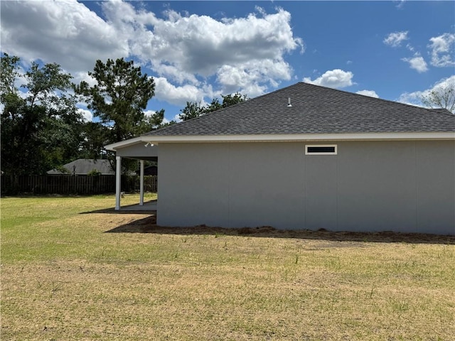 100 Haven Ct, Brunswick, GA 31523 - view of home's exterior featuring roof with shingles and a patio