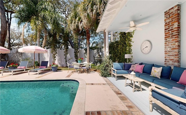 231 Magnolia Ave, Saint Simons Island, GA 31522 - view of pool with outdoor lounge area, a patio, fence, and ceiling fan