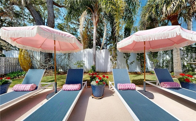 231 Magnolia Ave, Saint Simons Island, GA 31522 - view of patio / terrace with a fenced backyard