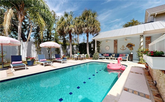 231 Magnolia Ave, Saint Simons Island, GA 31522 - view of swimming pool with outdoor lounge area, a patio, a ceiling fan, and fence