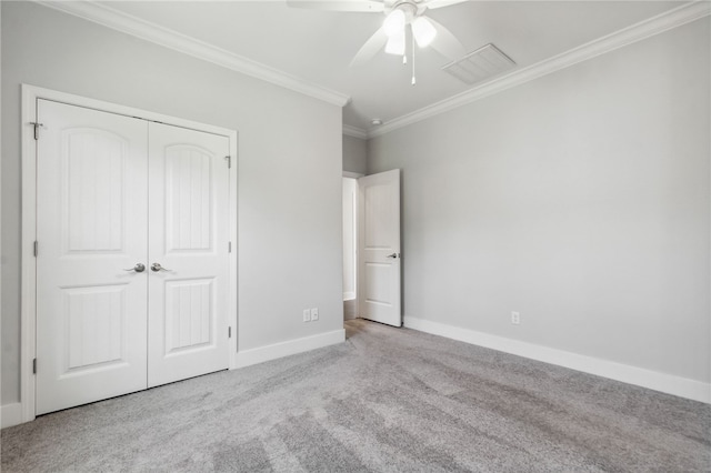 104 Tidal Marsh Way, Saint Marys, GA 31558 - unfurnished bedroom featuring carpet flooring, crown molding, baseboards, a closet, and ceiling fan