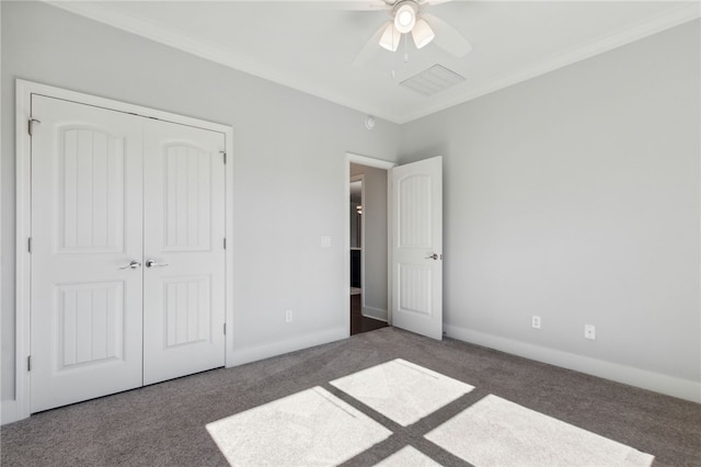 104 Tidal Marsh Way, Saint Marys, GA 31558 - unfurnished bedroom featuring carpet, a closet, a ceiling fan, crown molding, and baseboards