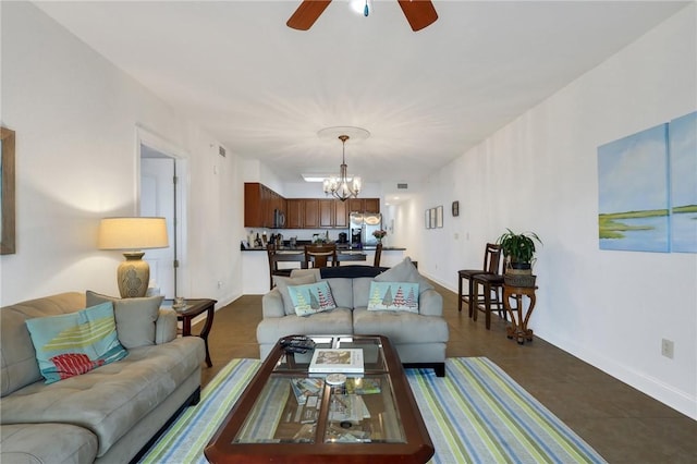 760 Ocean Blvd Unit 402, Saint Simons Island, GA 31522 - living room with a chandelier, ceiling fan, and baseboards