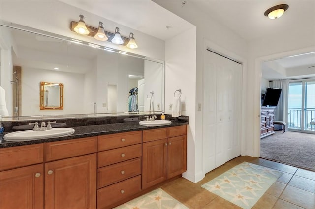 760 Ocean Blvd Unit 402, Saint Simons Island, GA 31522 - full bathroom featuring double vanity and tile patterned flooring