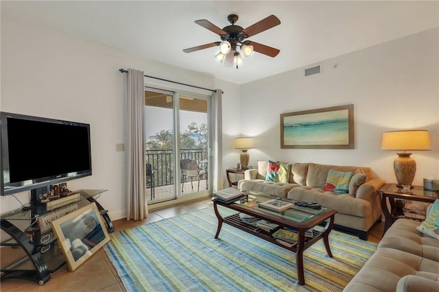 760 Ocean Blvd Unit 402, Saint Simons Island, GA 31522 - living room featuring ceiling fan, baseboards, and light tile patterned floors