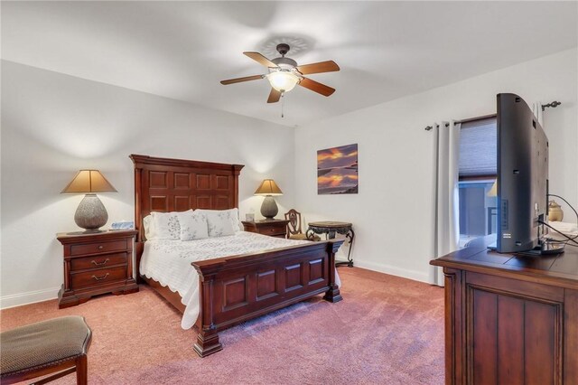 760 Ocean Blvd Unit 402, Saint Simons Island, GA 31522 - bedroom with carpet, baseboards, and ceiling fan